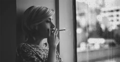 woman smoking to calm her adhd woman smoking to calm her adhd